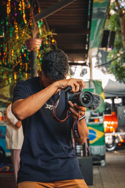 Photographer capturing a moving subject with autofocus, showing focus tracking in action