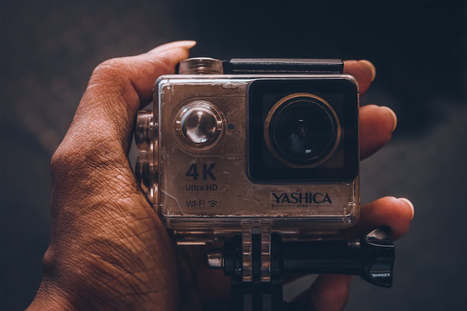 Photographer adjusting camera Wi‑Fi pairing settings before transferring photos