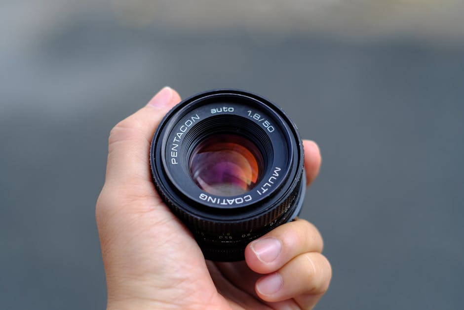 Close-up of camera lens with multi-coatings, illustrating “Lens Coatings Explained: How Multi-Coatings Affect Flare”