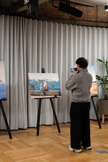 Photographer sending an online client photo gallery link on a phone