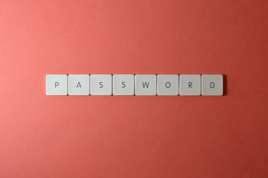 Photographer reviewing a cybersecurity checklist with passkeys and 2FA, “How to Harden Your Photography Accounts” theme.