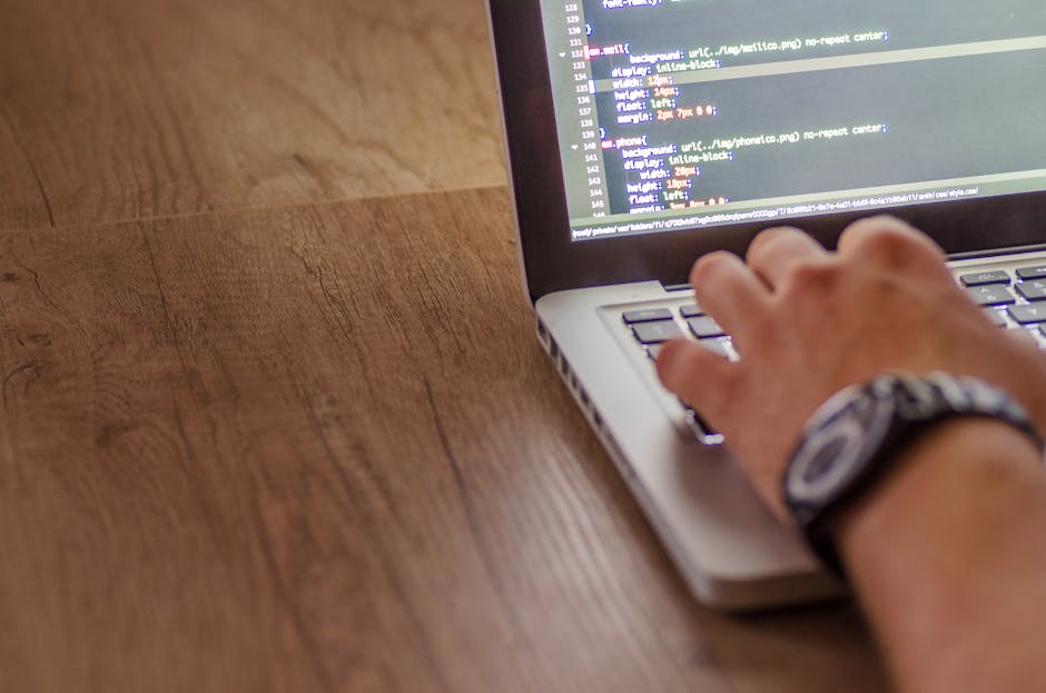 Close-up of recovery codes being written and stored securely for account recovery
