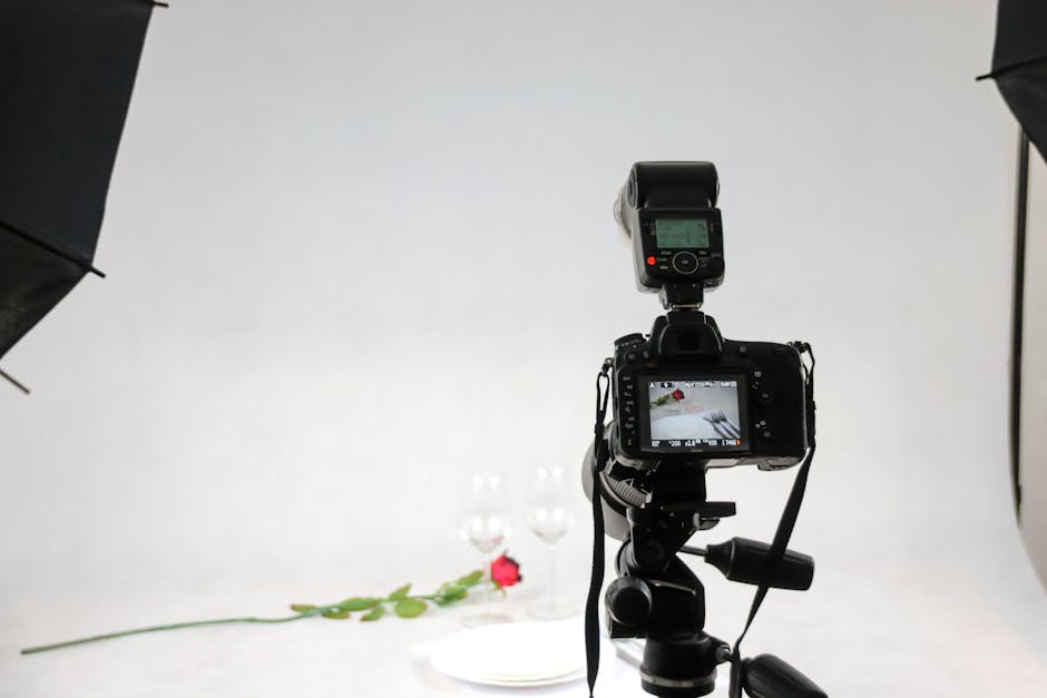 Tabletop product setup with controlled lighting and visible reflections and shadows on a glossy item.