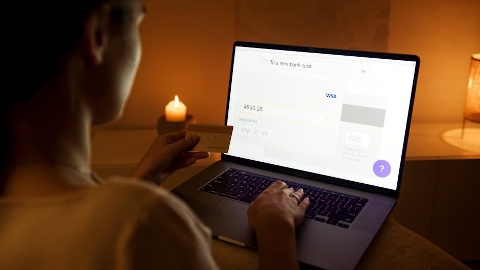 Photographer at a laptop enabling passkeys or 2FA security settings